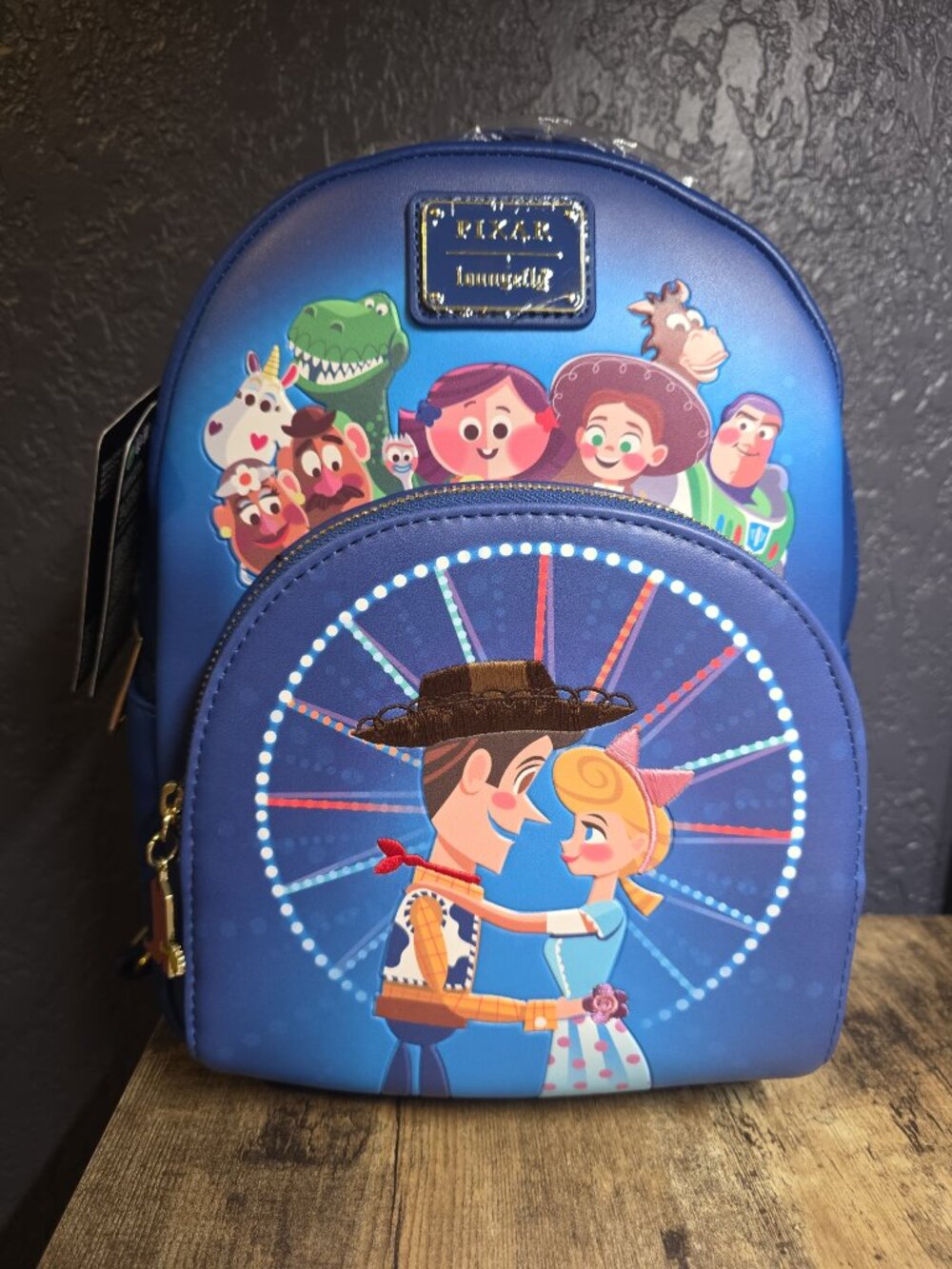 Loungefly Disney Pixar Toy Story Moments Woody Bo Peep & Friends Mini Backpack